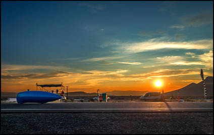 Carbon Monocoque Racer In Sunset