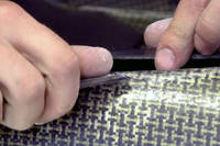 Remove any loose or broken resin or fiber