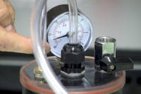 Pulling a vacuum and leak testing