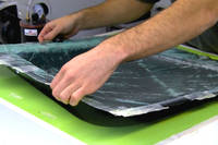 Remove vacuum bagging materials and demold the part