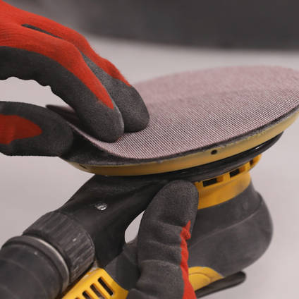 Attaching a Mirka Abranet ACE Abrasive Disc to the Sander