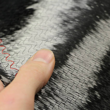 300gsm Biaxial Carbon Fiber Reinforcement, Reverse Side - In Hand Closeup
