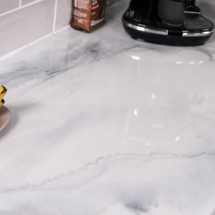 Carrara Marble Resin Countertops Create a Stunning Contemporary Kitchen