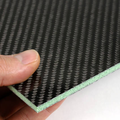 Foam Cored Carbon Fiber Panel in Hand Closeup