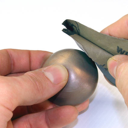 Bronze Powder sanded to create a "brushed" finish