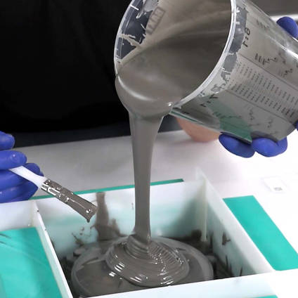 Pouring TC80 Tool Cast Epoxy Casting Resin Over a Pattern to Make a Mold