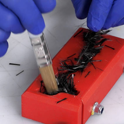 Loading Chopped Carbon Fiber Tow Into 3D Printed Compression Mold