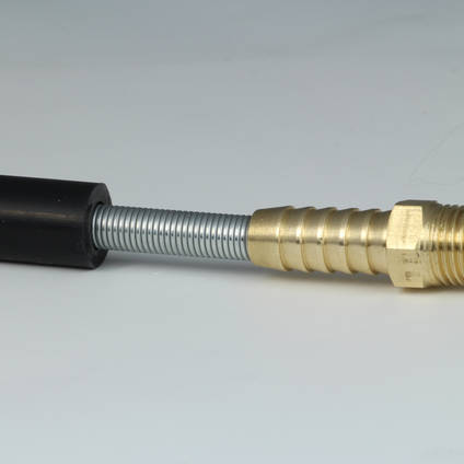 Assembly of spring, hose and barb