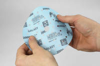 Mirka Galaxy Finishing Pads in Hand Being Flexed Thumbnail