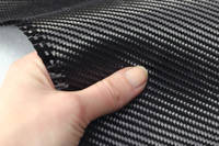 240g 2x2 Twill 3k Carbon Fiber Cloth In Hand Closeup Thumbnail