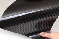 Carbon Fiber Veneer Being Easily Flexed by Hand Thumbnail