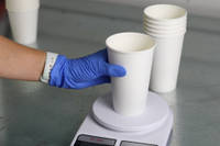 Medium Mixing Cups in Use Weighing Resin on Scales Thumbnail