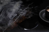 GlassCast Cosmic Black Granite Resin Countertop Coffee Cup Closeup Thumbnail