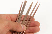 Perma-Grit Set of 5 Needle Files Including Handle in Hand Thumbnail