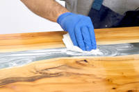 Applying NW1 Polishing Compound to a river table Thumbnail